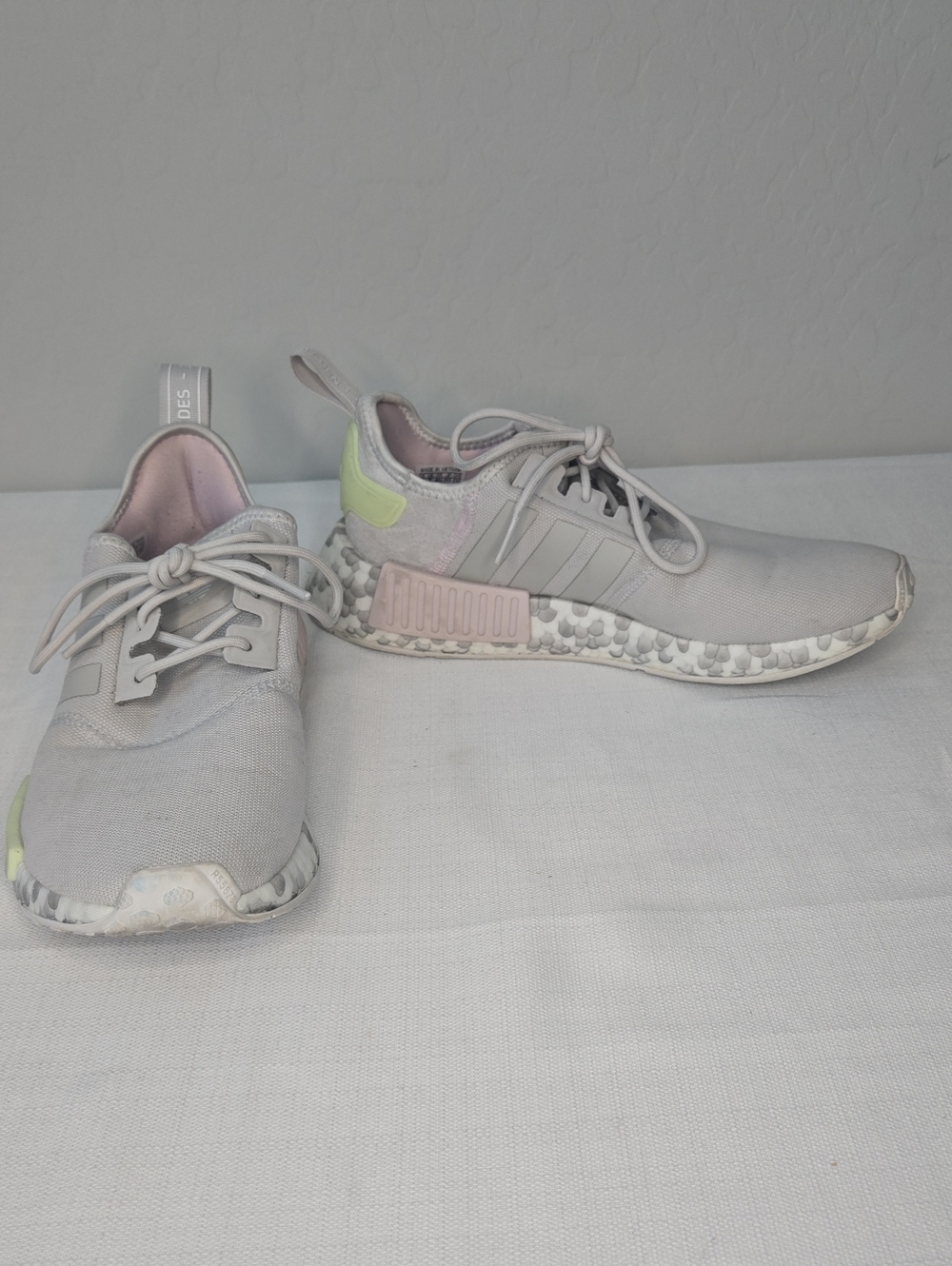 adidas light gray sneakers with pink and lime accents